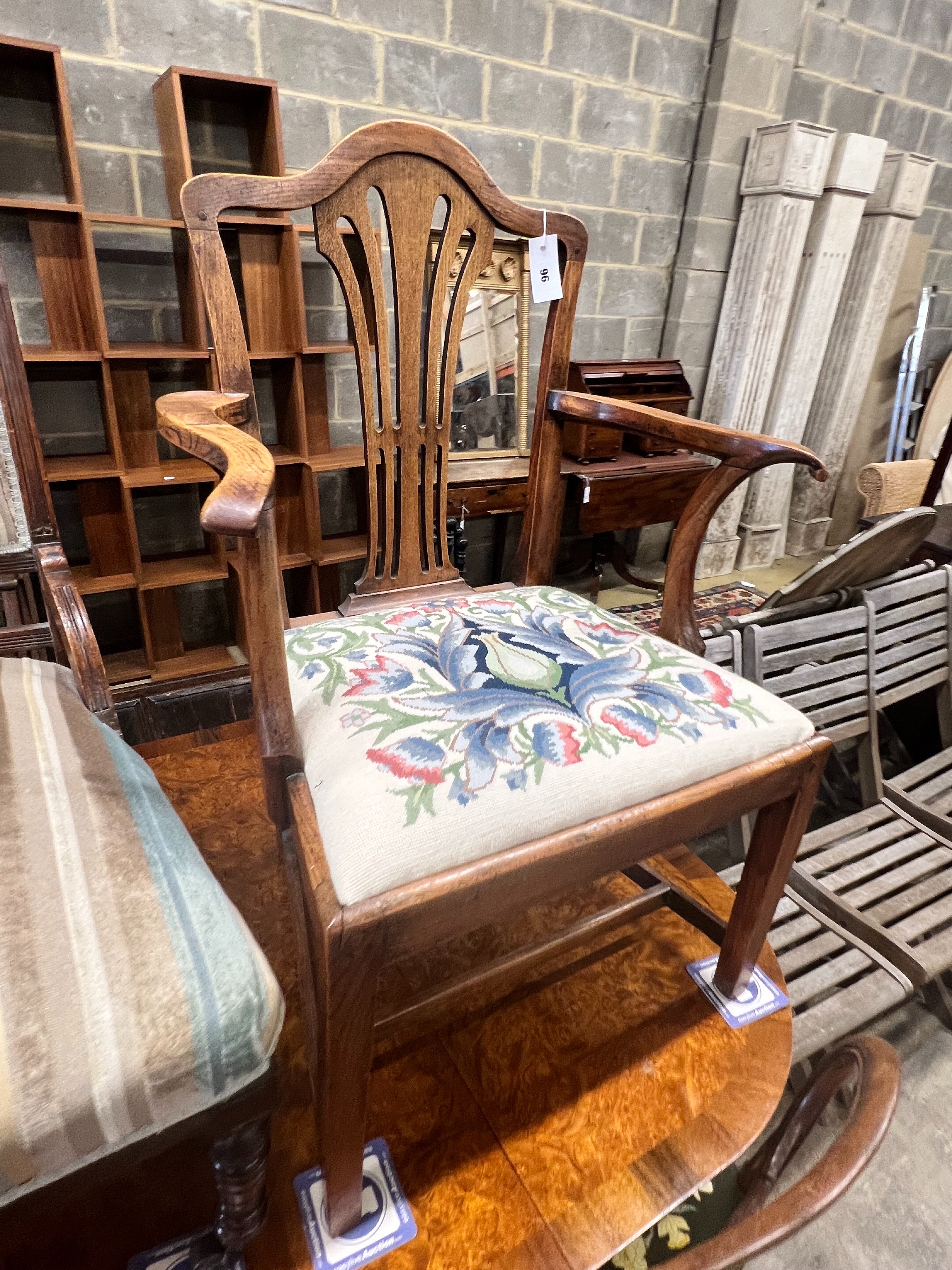 A George III Provincial elm elbow chair, a Victorian nursing chair, and a dining chair